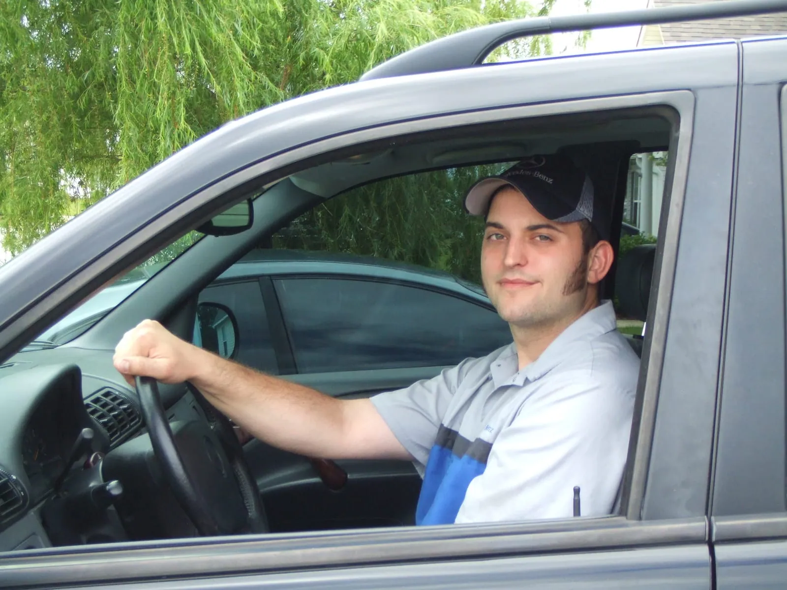 The technician behind Newmoyer Mercedes Specialist, in Mercedes-Benz service uniform